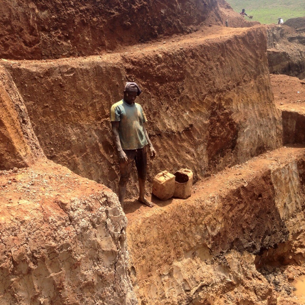 A miner works at excavating sapphire-bearing gravels on the Mambilla Plateau, Nigeria. Photo courtesy of Brume Jeroh