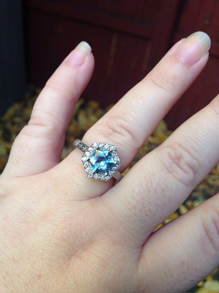 A photo from a customer review featuring a Montana sapphire set in a ring not made by Earth's Treasury