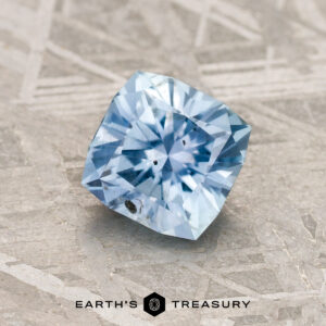 A blue Montana sapphire in our "Aurora" square cushion design
