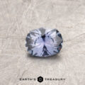 A blue Montana sapphire in a custom oval desing