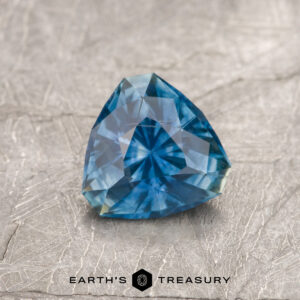 A blue Montana sapphire in our "Triptych" trillion design