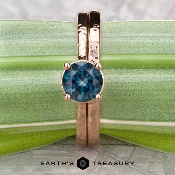 The "Mila" in 14k rose gold, hammered and polished, with 1.18-carat Montana sapphire, alongside the custom-fit straight band in 14k rose gold The "Mila" in 14k rose gold, hammered and polished, with 1.18-carat Montana sapphire, alongside the custom-fit straight band in 14k rose gold