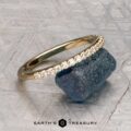 The Petite Prong-Set Straight Band in 18K yellow gold