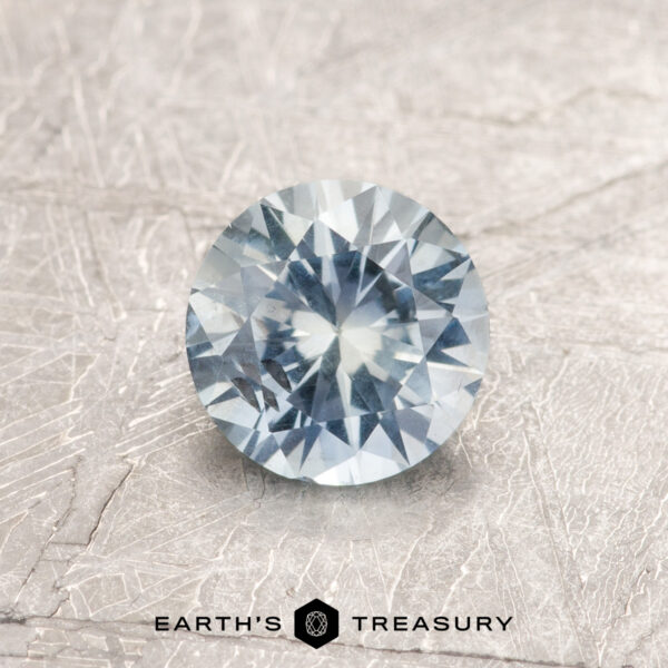 0.84-Carat Pale Blue-Green Montana Sapphire A blue Montana sapphire in a classic diamond round brilliant design