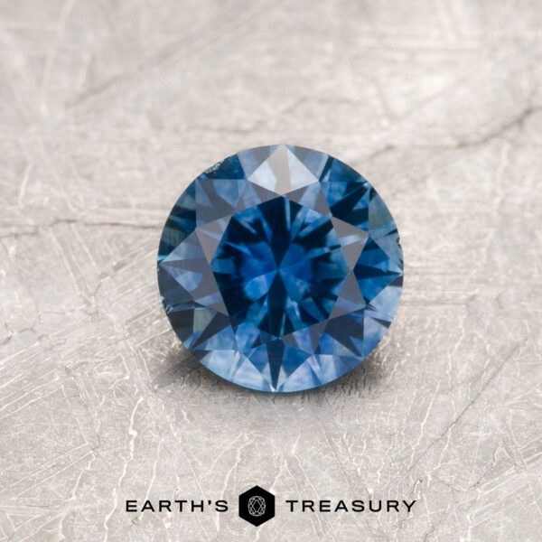 0.77-Carat Medium Blue Montana Sapphire (Heated) A blue Montana sapphire in a classic diamond round brilliant design