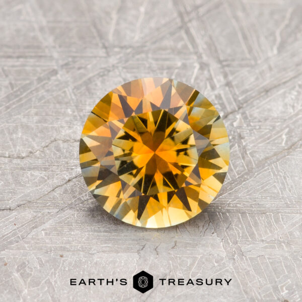 1.16-Carat Orange-Blue Particolored Montana Sapphire (Heated) A yellow Montana sapphire in a classic diamond round brilliant design