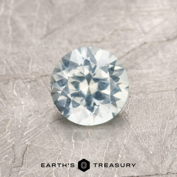 0.82-Carat Near Colorless Montana Sapphire A white Montana sapphire in a classic diamond round brilliant design