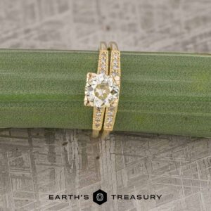 The "Alexandra ring" in 18k yellow gold with 1.17-Carat Diamond alongside the "Alexandra" band in 18k yellow gold