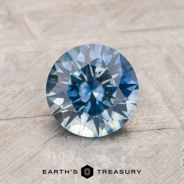 1.29-Carat Teal Blue Montana Sapphire (Heated) A blue-green Montana sapphire in a classic diamond round brilliant design