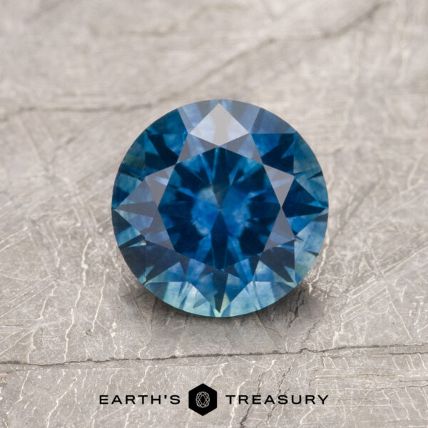 1.21-Rich Blue Montana Sapphire (Heated) A blue Montana sapphire in a classic diamond round brilliant design