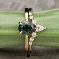 The "Flora" ring in 14k yellow gold with 1.48-Carat Australian Sapphire alongside the "Merope" band in 14k yellow gold