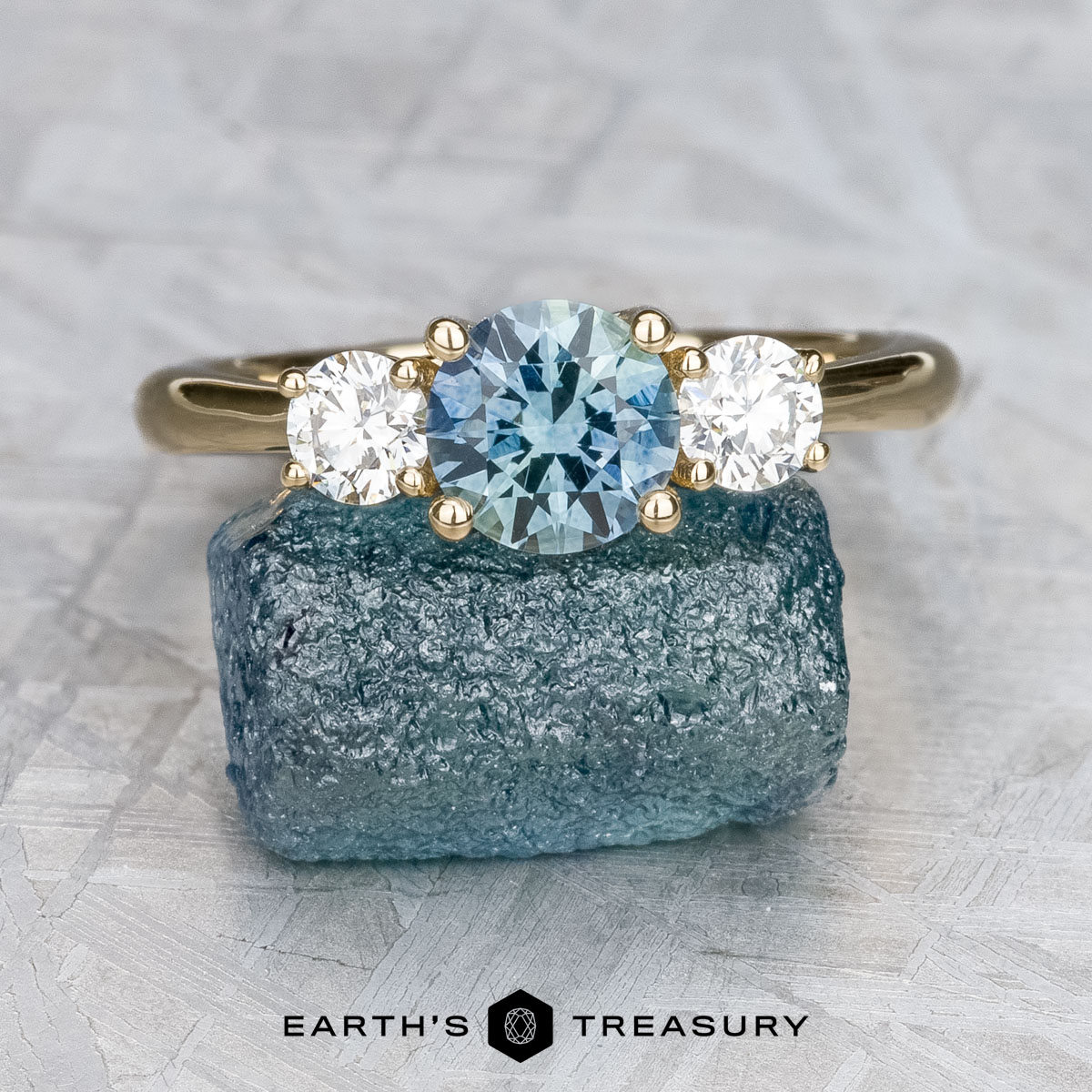 The Wisteria Three-Stone Trellis Ring by Earth's Treasury