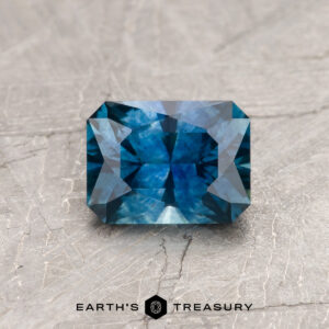 A blue Montana sapphire in our "Fourth of July" rectangle design