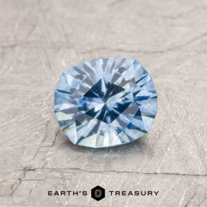 A blue Montana sapphire in our "Hyperbola" oval design