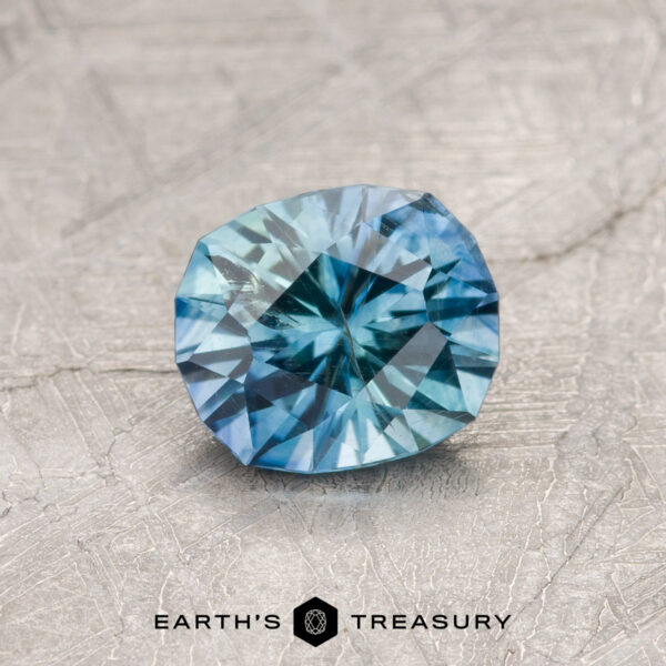 0.89-Carat Teal Blue Montana Sapphire (Heated) A particolored Montana sapphire in our "Hyperbola" oval design