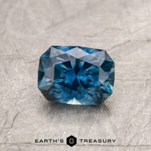 A blue-green Montana sapphire in our "Eureka" rectangle design
