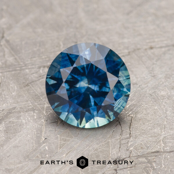 1.07-Carat Rich Peacock Blue Montana Sapphire (Heated) A blue-green Montana sapphire in a classic diamond round brilliant design