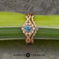 The "Passiflora" Ring in 14k Rose Gold with 0.71-Carat Montana Sapphire , alongside the "Passiflora" band in 14k rose gold