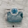 The Petite Pave Halo in 18K white gold with 0.95-Carat Montana Sapphire