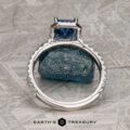 The Petite Pave Halo Ring in 14K white gold with 1.70-Carat Montana Sapphire, alongside the petite pave band in 14k white gold