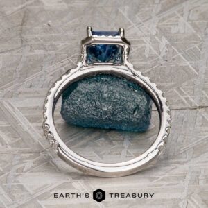 The Petite Pave Halo Ring in 14K white gold with 1.70-Carat Montana Sapphire, alongside the petite pave band in 14k white gold