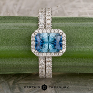 The Petite Pave Halo Ring in 14K white gold with 1.70-Carat Montana Sapphire, alongside the petite pave band in 14k white gold