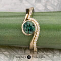 The "Calliste" ring in 14K yellow gold with 1.12-carat Montana sapphire, alongside the "Calliste" band in 14K yellow gold