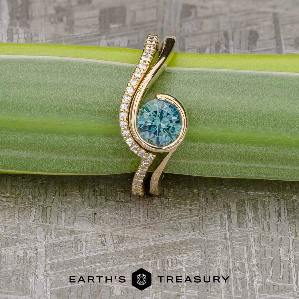 The "Calliste" Ring in 14k Yellow Gold with 1.13-Carat Montana Sapphire, alongside the "Calliste" band in 14k yellow gold