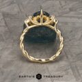 The Braided "Liriope" ring in 18k yellow gold with 1.85-carat Umba sapphire