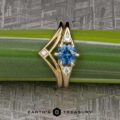 The "Halley" ring in 14k yellow gold with 1.23-Carat Montana Sapphire , alongside the "Halley" band in 14k yellow gold