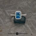 The Petite Pave Halo Ring in 14k white gold with 1.70-Carat Montana Sapphire