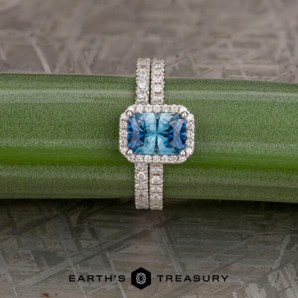 The Petite Pave Halo Ring in 14k white gold with 1.70-Carat Montana Sapphire, alongside the petite pave band in 14k white gold