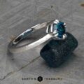 The “Capella” ring in 18k white gold, hammered and brushed, with 1.31-Carat Montana Sapphire