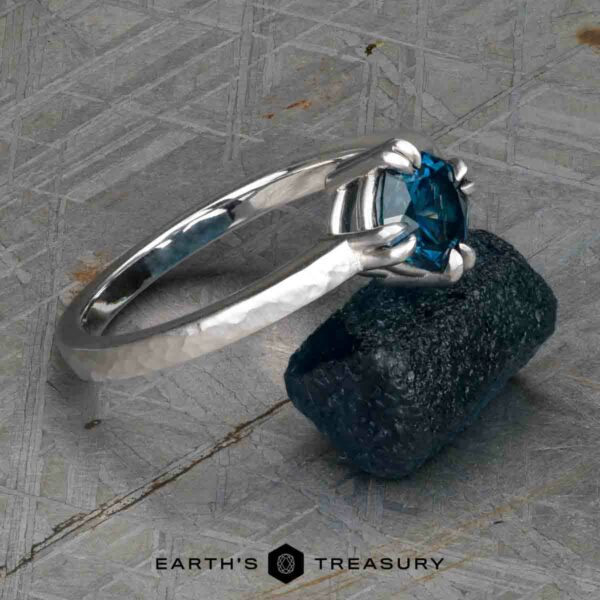 The “Capella” ring in 18k white gold, hammered and brushed, with 1.31-Carat Montana Sapphire The “Capella” ring in 18k white gold, hammered and brushed, with 1.31-Carat Montana Sapphire