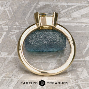 A gold Larisa Solitaire ring with a clear gemstone is displayed upright before a rough blue stone, labeled "Stacked from 53 images. Method=B (R=8,S=4)" below.