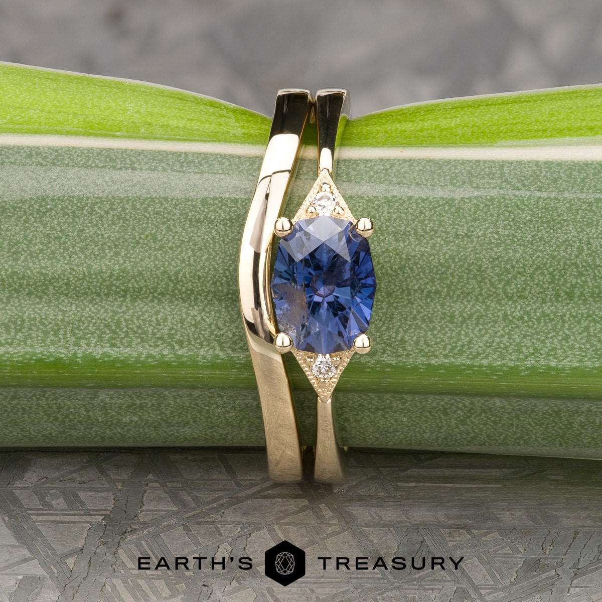The "Niamh" in 14k yellow gold with 1.62-carat Umba sapphire, alongside the custom-fit contour band