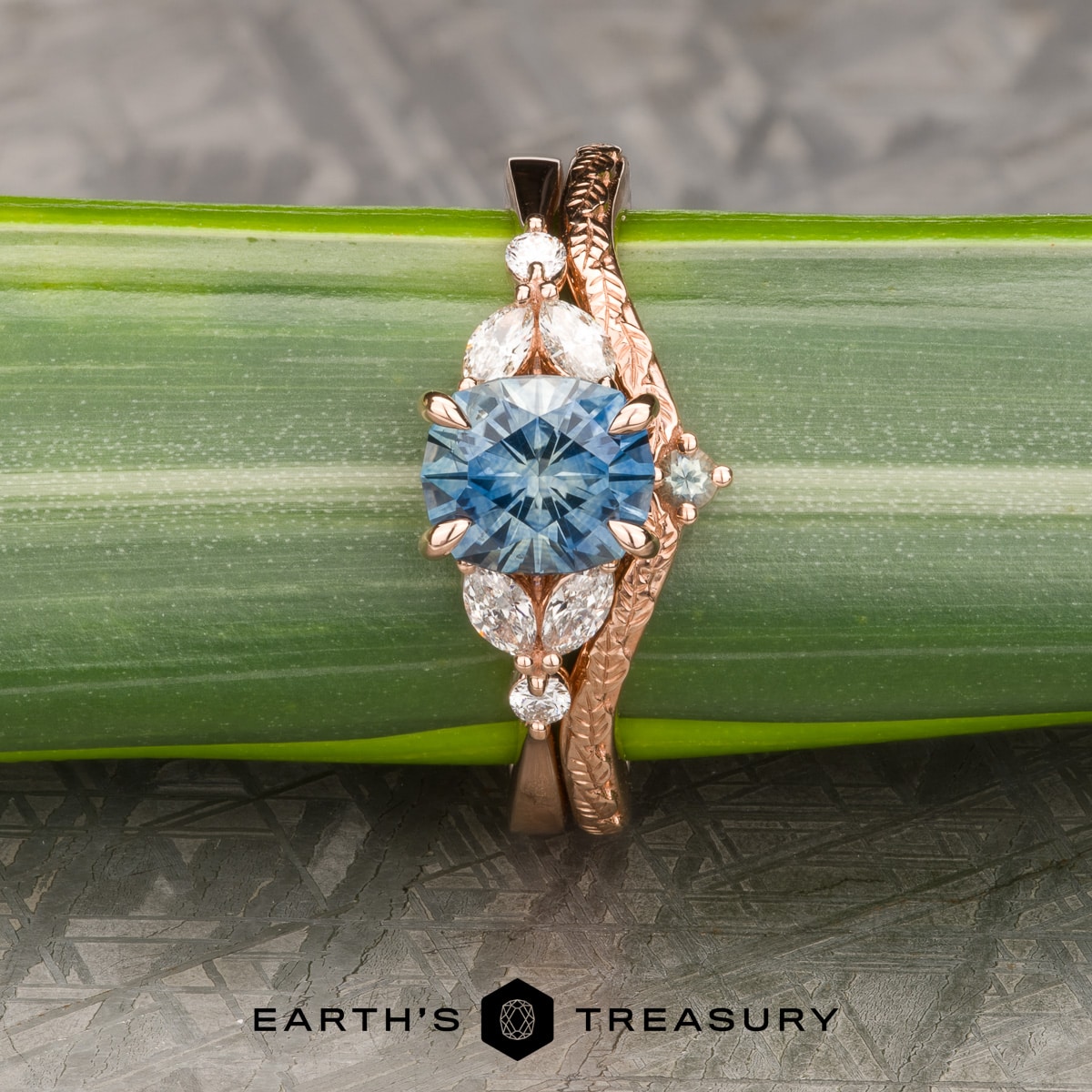 The "Cattleya" ring in 14k rose gold with 1.89-carat Montana sapphire, alongside the "Passiflora" band