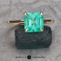 The “Lyra” ring in 14k yellow gold with 1.75-carat emerald