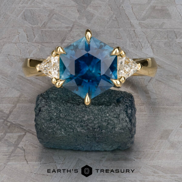 The “Mielikki” ring in 18k yellow gold with 2.76-Carat Montana sapphire, 4.0mm trillion diamonds The “Mielikki” ring in 18k yellow gold with 2.76-Carat Montana sapphire, 4.0mm trillion diamonds