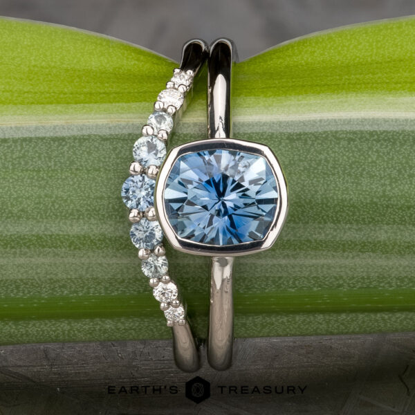 The "Deirdre" ring in platinum with 1.49-carat Montana sapphire, alongside the ombre "Rhine" band in platinum The "Deirdre" ring in platinum with 1.49-carat Montana sapphire, alongside the ombre "Rhine" band in platinum