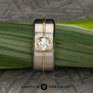 The "Perseus" in Platinum and 18k yellow gold with custom-cut diamond