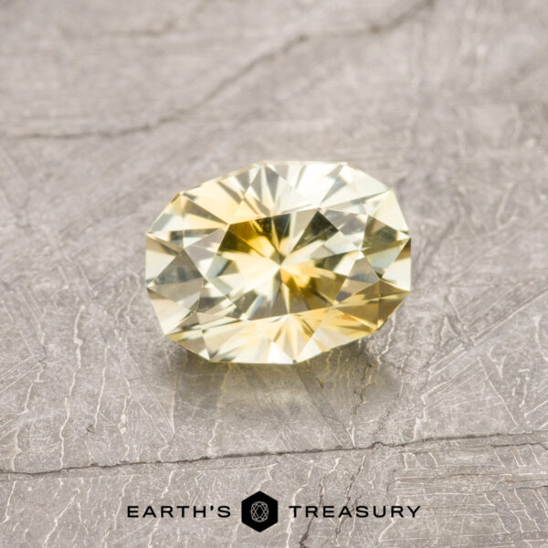 0.71-Carat Yellow-Gold Particolored Montana Sapphire (Heated) A particolored Montana sapphire in our "Testudo" oval design