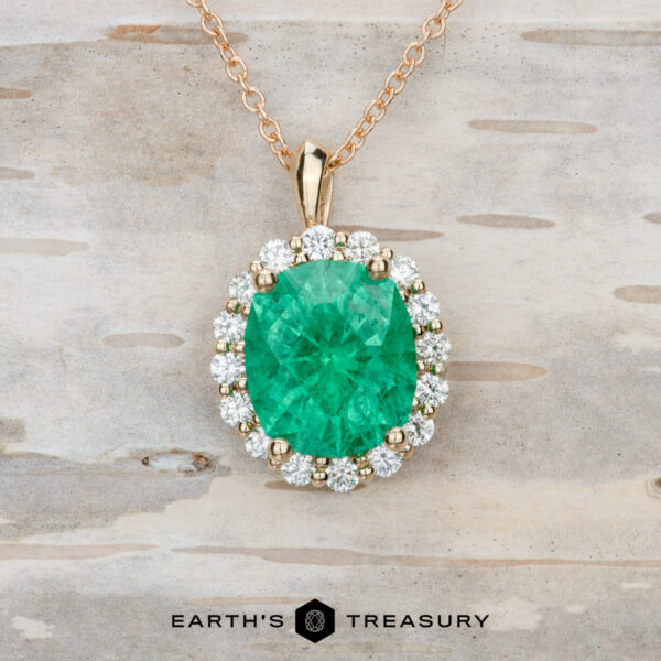 The BYO Classic Diamond Halo Pendant in 14k yellow gold with 2.88-carat emerald The BYO Classic Diamond Halo Pendant in 14k yellow gold with 2.88-carat emerald