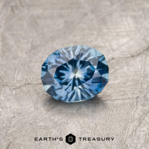 A blue Montana sapphire in our "Serendipity" oval design