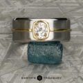 The "Perseus" ring in platinum and 18k yellow gold with custom-cut diamond