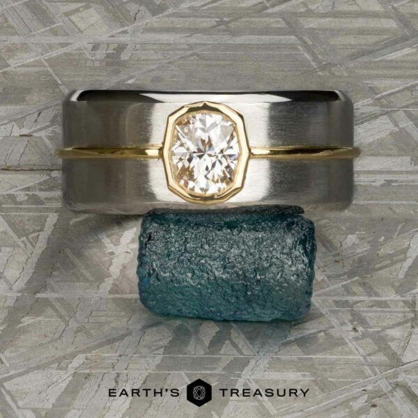 The "Perseus" ring in platinum and 18k yellow gold with custom-cut diamond The "Perseus" ring in platinum and 18k yellow gold with custom-cut diamond