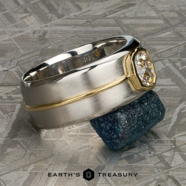 The "Perseus" ring in platinum and 18k yellow gold with custom-cut diamond The "Perseus" ring in platinum and 18k yellow gold with custom-cut diamond
