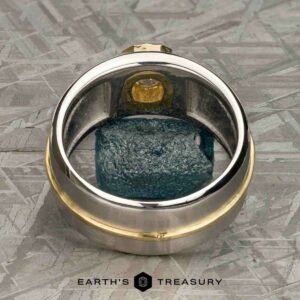 The "Perseus" ring in platinum and 18k yellow gold with custom-cut diamond