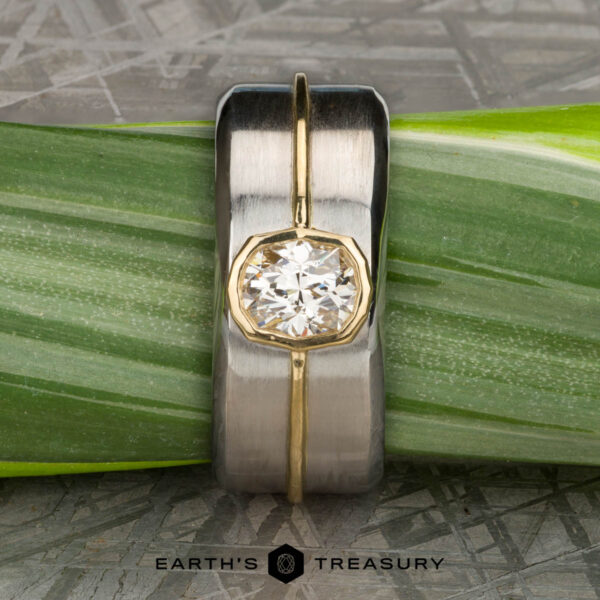 The "Perseus" ring in platinum and 18k yellow gold with custom-cut diamond The "Perseus" ring in platinum and 18k yellow gold with custom-cut diamond