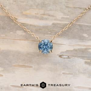 The BYO "Glow" Station Necklace in 14k yellow gold with 0.60-carat Montana sapphire
